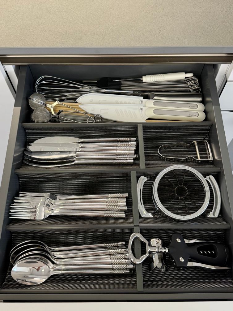 Plenty of cutlery and cooking utensils
