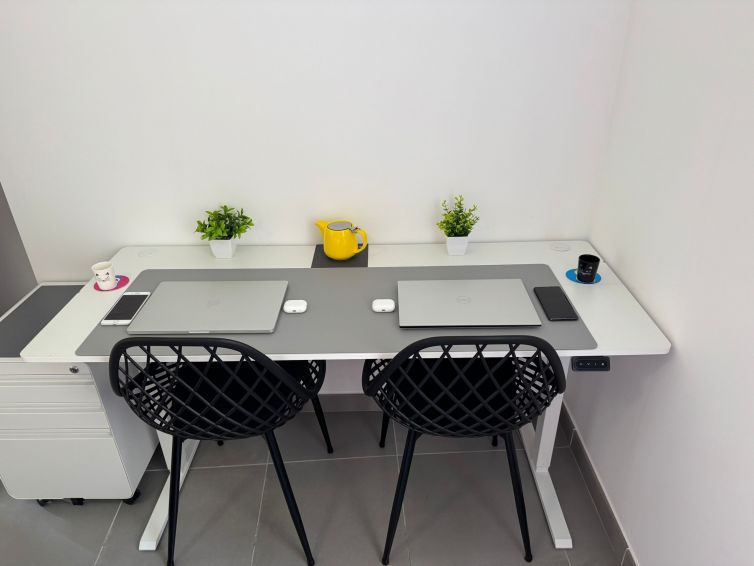 The desk can be adjusted for sitting, standing, or even used as a bar